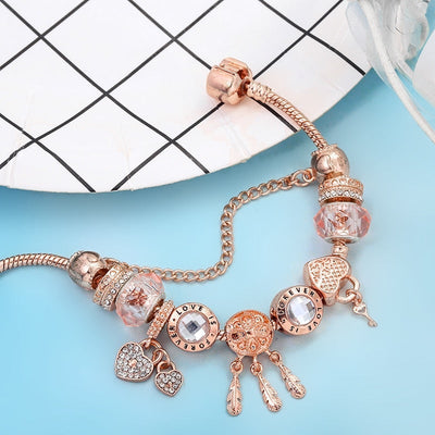 VIVILY | Elegantes Armband mit romantischen Rosen und silbernen Anhängern
